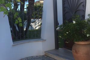 Appartamento in villa centrale con ampio giardino