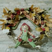 Ghirlanda artigianale con fiori secchi