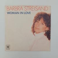 Disco 45 giri Woman in love / Run wild