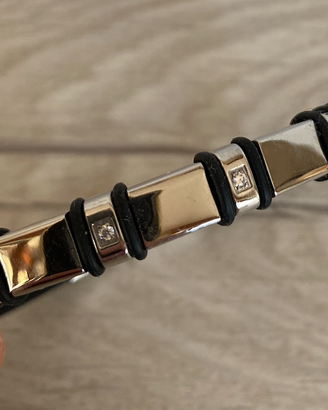 Bracciale nero con inserti metallici e brillanti