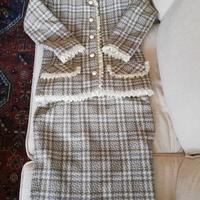 Completo di lana e passamaneria