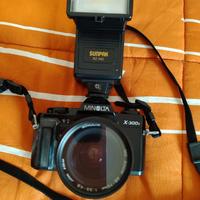 Minolta X-300s + Zoom 28-70mm + Flash Sunpak + Acc