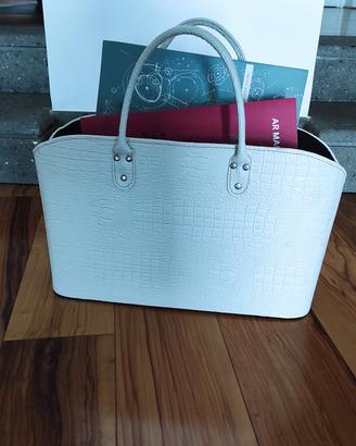 portariviste in pelle bianca