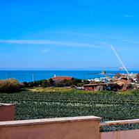 Agosto Attico vicino al mare