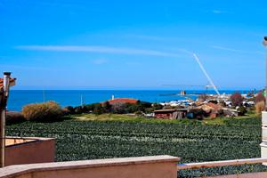 Agosto Attico vicino al mare