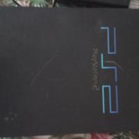 ps2 con accessori e un gioco 