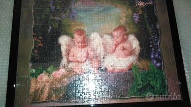 Quadro "Angeli neonati" - puzzle incorniciato