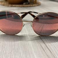 Occhiali Polaroid rosa montatura oro