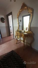 console oro con base in marmo 