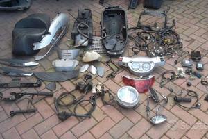 Beverly 500 06: scudo faro motore pompa pinza km