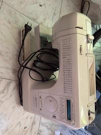 Macchina per cucire aurora d agostino con computer