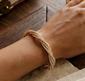bracciale elastico a spirale dorato con strass