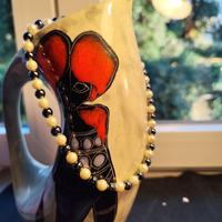 1960. Girocollo corto perle naturali e bachelite