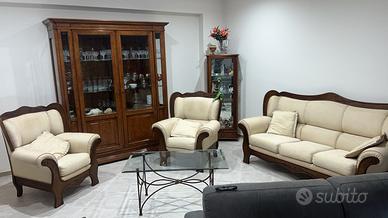 Divano poltrona tavolino tenda