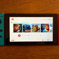 Nintendo switch + giochi + volante mario kart