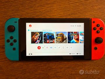 Nintendo switch + giochi + volante mario kart