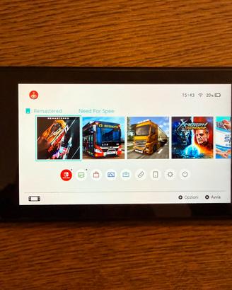 Nintendo switch + giochi + volante mario kart