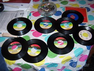 8 DISCHI VINILE 45 GIRI ADRIANO CELENTANO