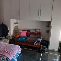 Camera da letto a ponte più letto contenitore