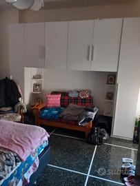 Camera da letto a ponte più letto contenitore