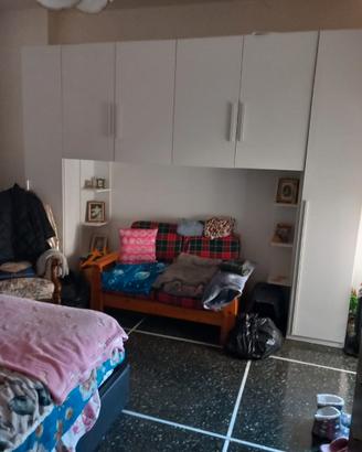 Camera da letto a ponte più letto contenitore