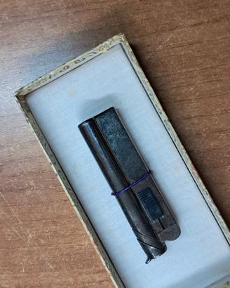 accendino vintage con "anima" a scomparsa 