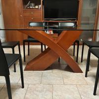 Tavolo in vetro a forma X piu 6 sedie similpelle
