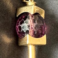 Pendente design 70 in oro e ametista