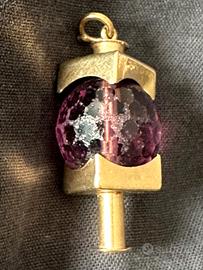 Pendente design 70 in oro e ametista