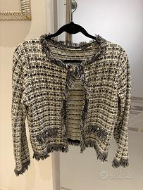Giacca in tweed bianca e nera con frange e bottoni