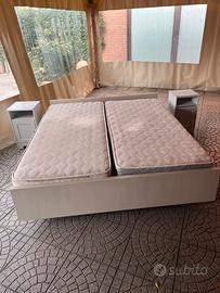 Letto matrimoniale con comodini