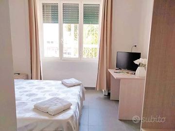 Camera con bagno in struttura al centro