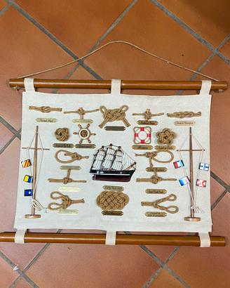 Quadro con nodi marinari e barchetta