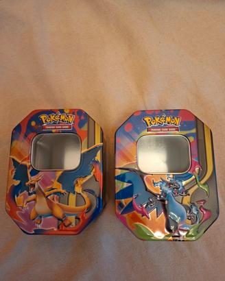 Due tin Charizard Megaevoluzione vuote