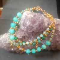 bracciale a tre con con pietre, cristalli,ematite