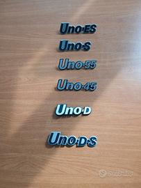 Set 6 scritte FIAT UNO 1^ Serie, plastica.  Nuove