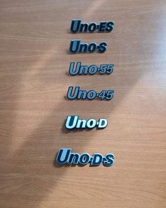 Set 6 scritte FIAT UNO 1^ Serie, plastica.  Nuove
