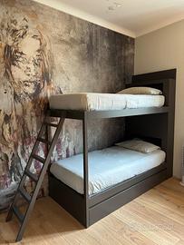 Letto a castello contenitore a cassettoni