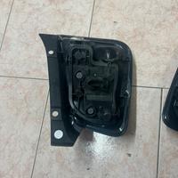 fari posteriori oscurati