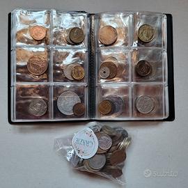 60 monete mondiali in album raccoglitore diverse