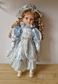 Bambola di porcellana da collezione vintage