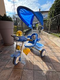 Triciclo bambino usato con maniglione e cappottina