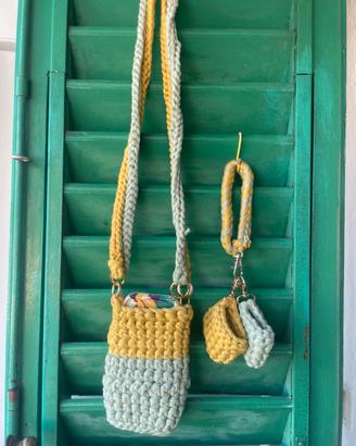 Set porta telefono+cuffie con tracolla e bracciale
