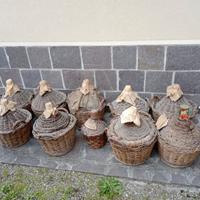 Damigiane da vino con cesta