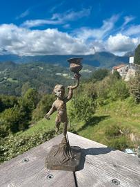 Candeliere a putto