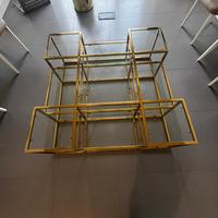 Tavolino di design in vetro e metallo dorato