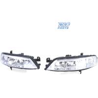 FARI PER OPEL VECTRA B 99-02 FONDO CROMATO