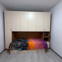 Armadio a ponte con letto singolo