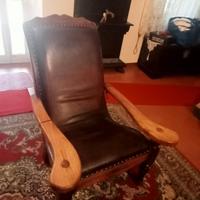 Poltrona vintage in pelle e legno massello 