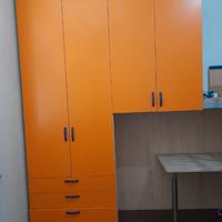 Letto a castello con armadio e scrivania